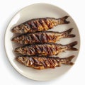 Plate of grilled fish isolated on white background, top view. Royalty Free Stock Photo